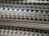 white metal rack on brown wooden table