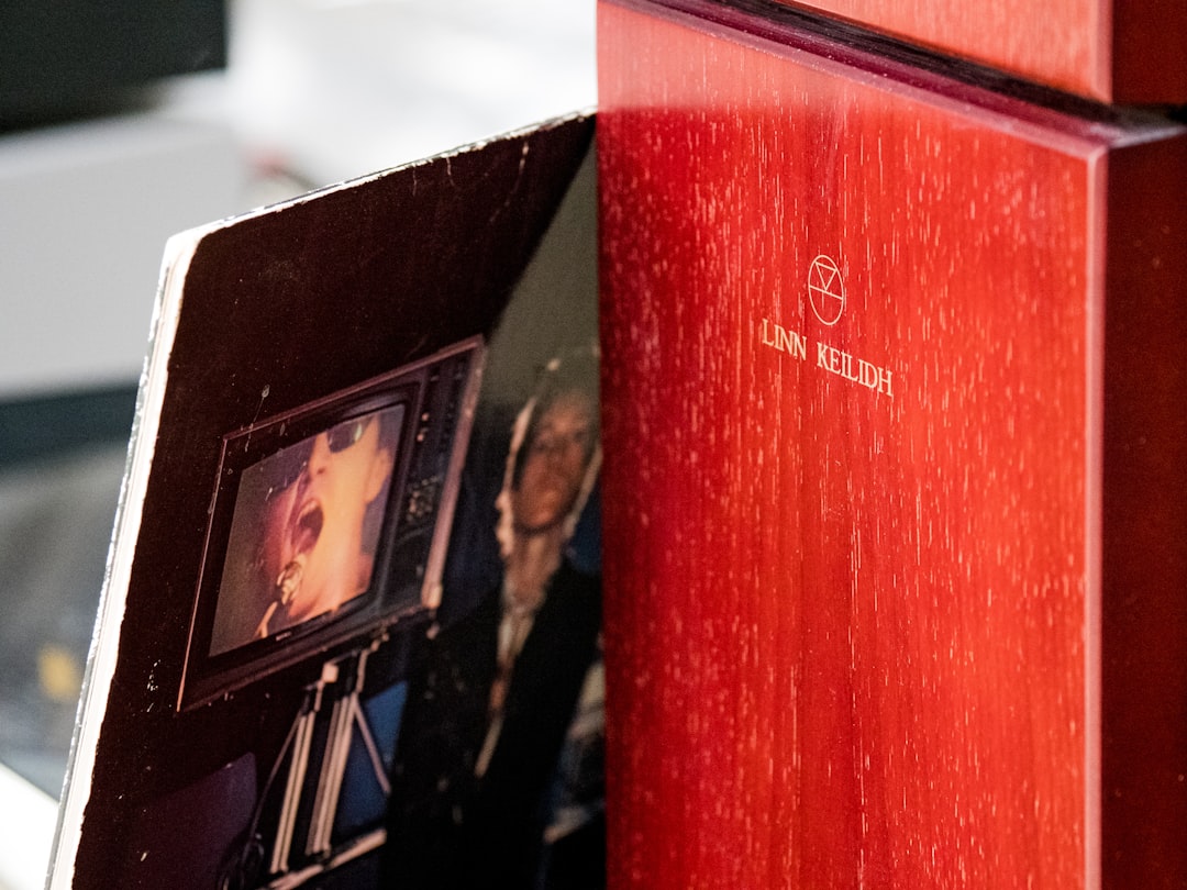 red and black box on brown wooden table