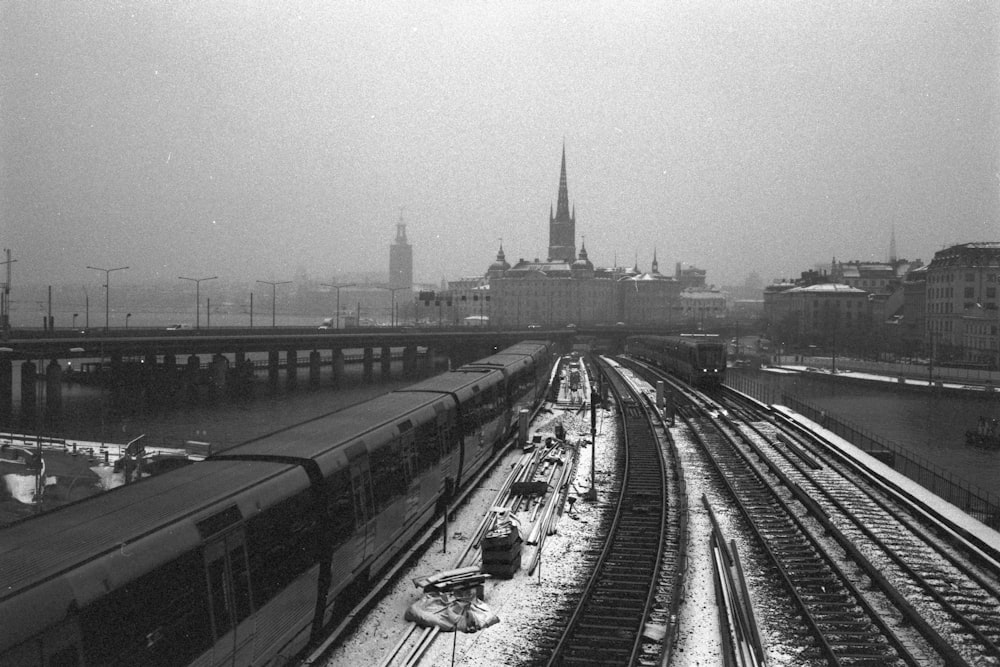 grayscale photo of city buildings