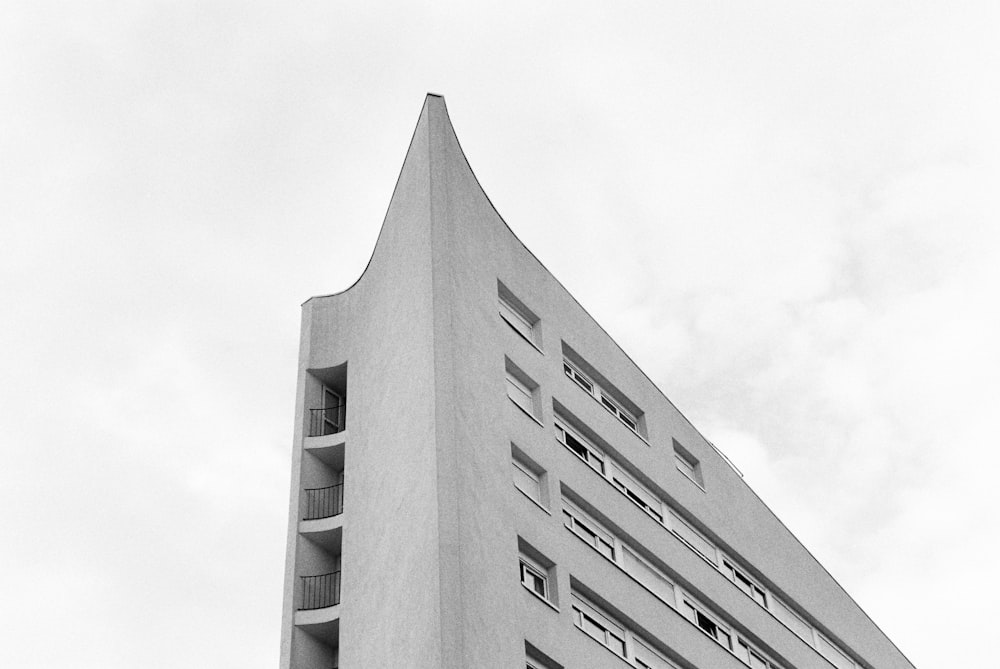 gray concrete building under white sky during daytime