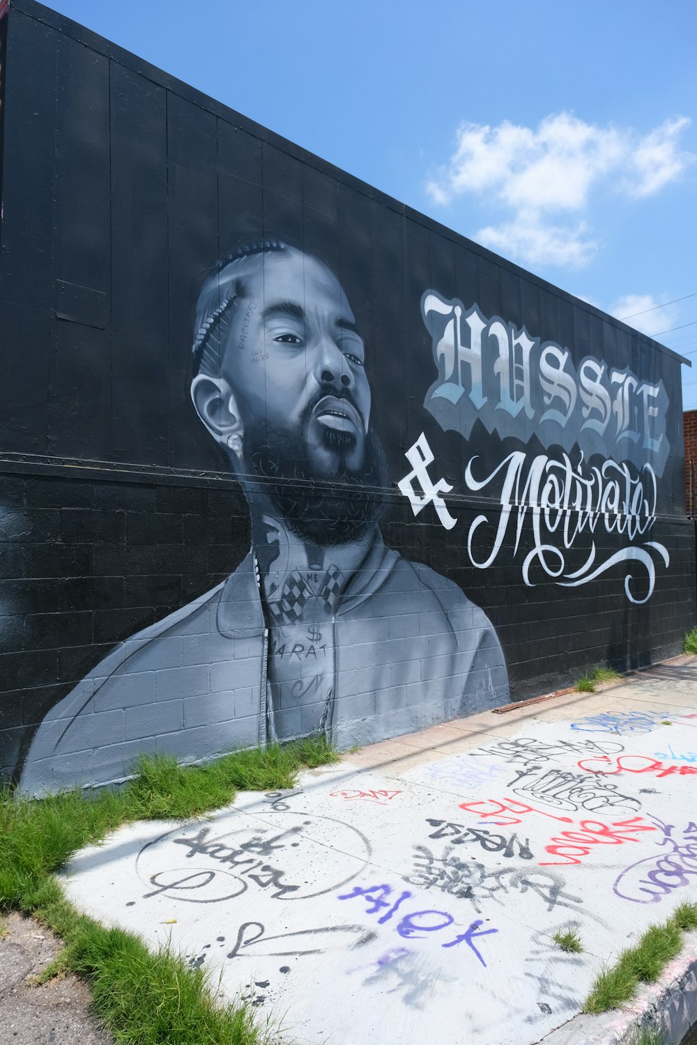 man in gray long sleeve shirt graffiti