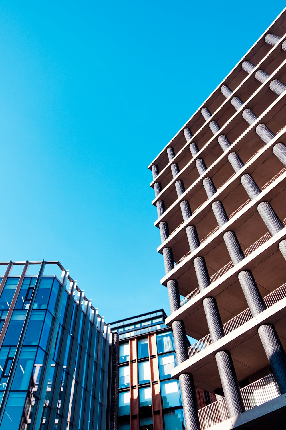 white concrete building under blue sky during daytime