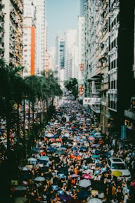 people in a city street during daytime