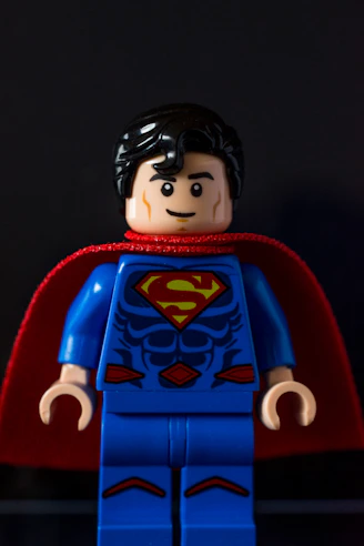 lego mini figure on red chair