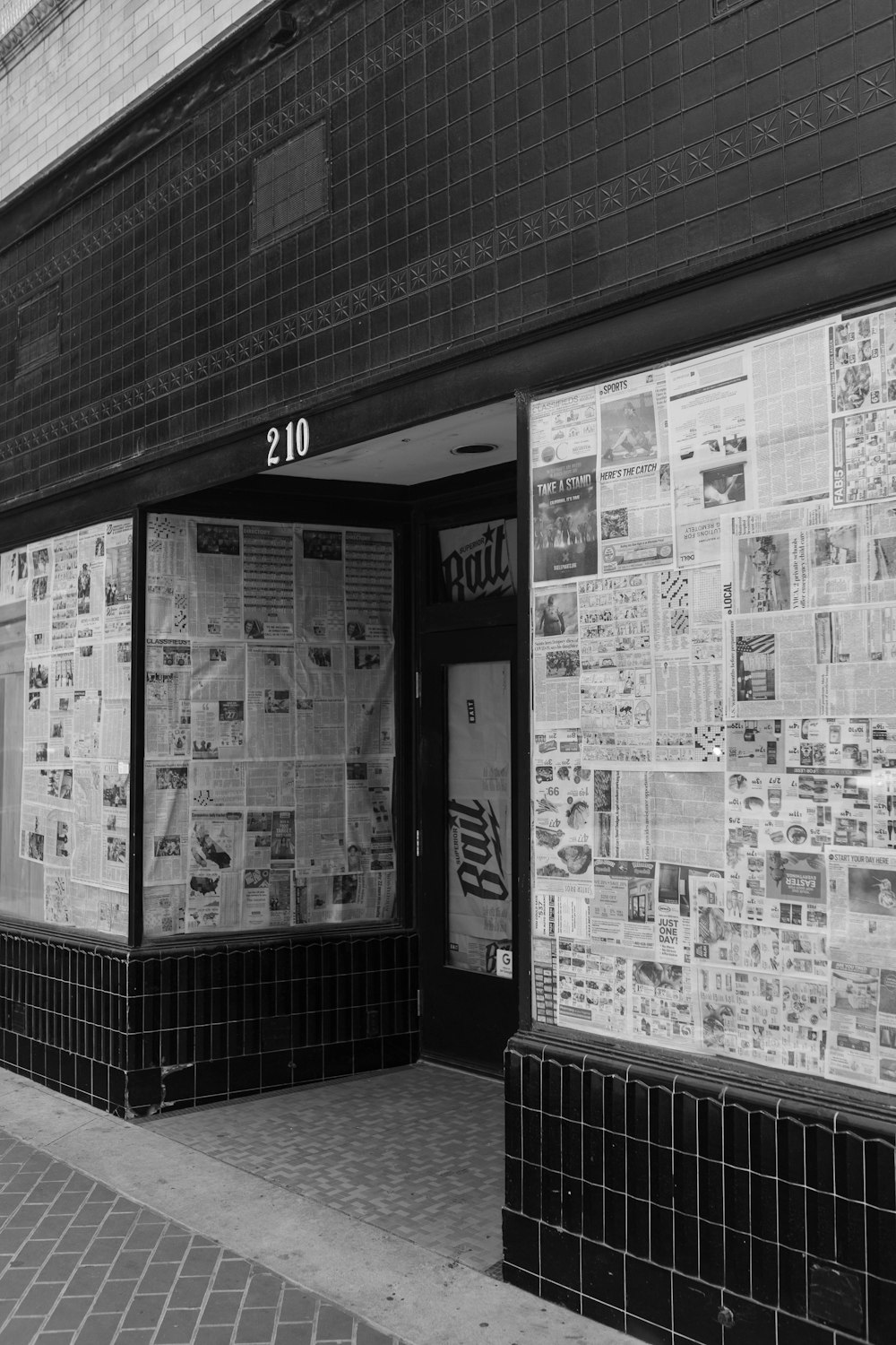 grayscale photo of a store