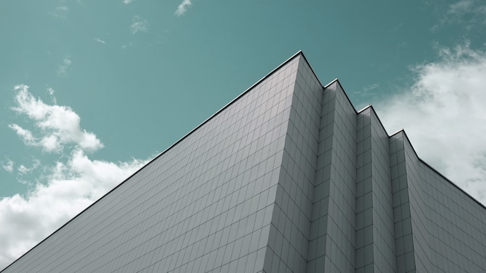 white concrete building under blue sky during daytime