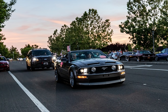black bmw car on road during daytime