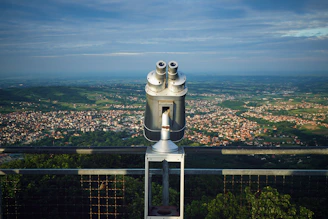 gray binoculars on top of the building