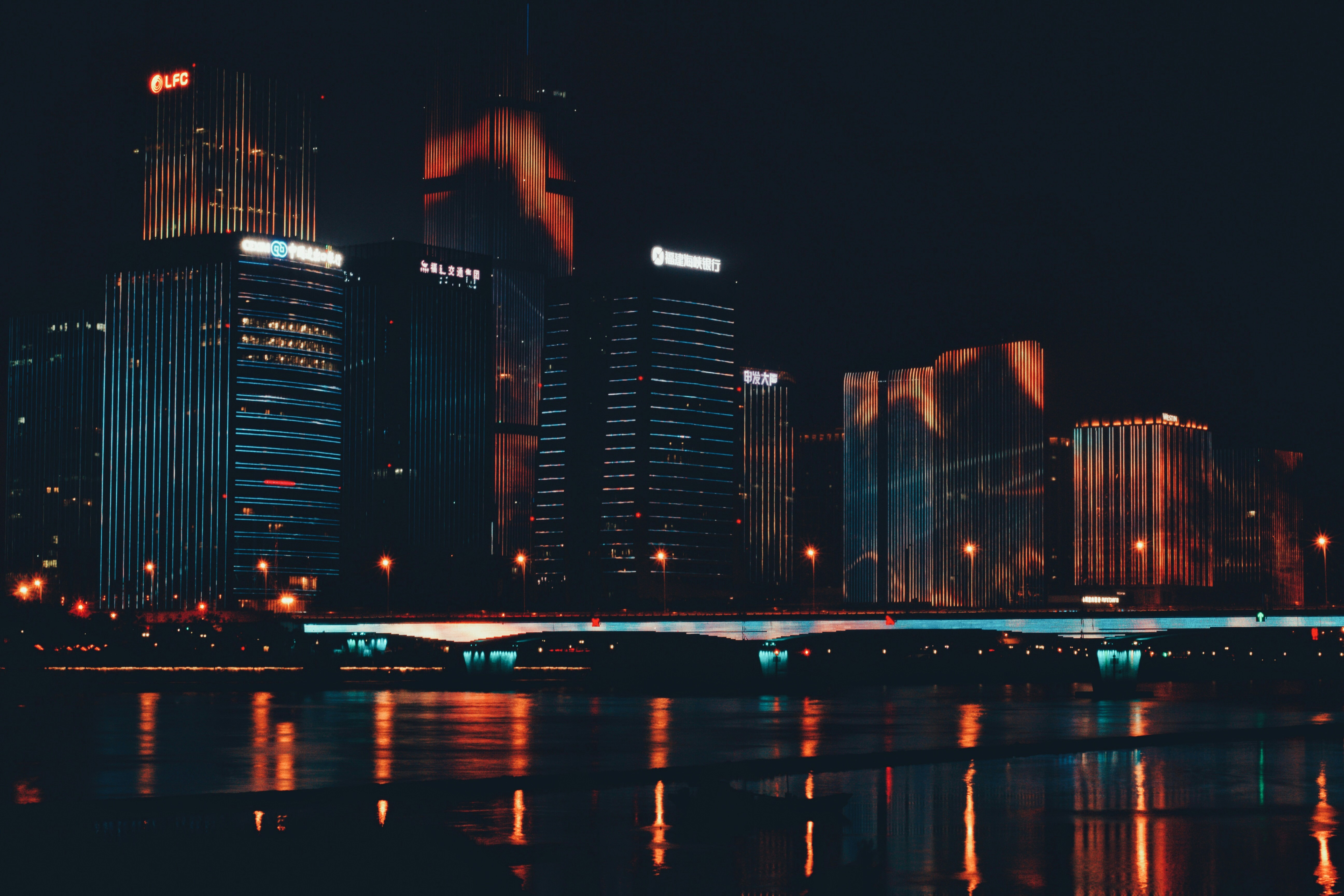 city skyline during night time