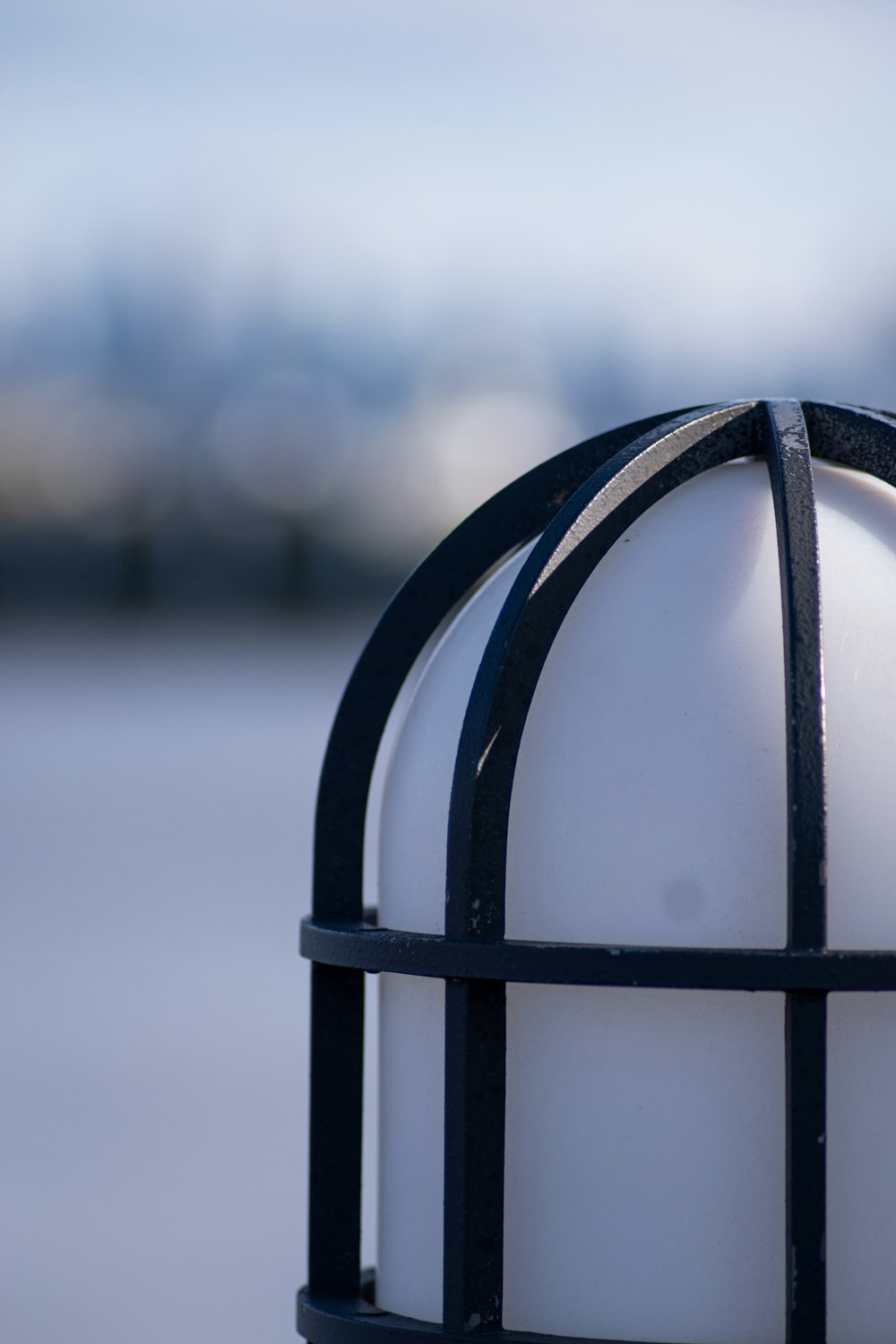 black metal round frame with snow on top