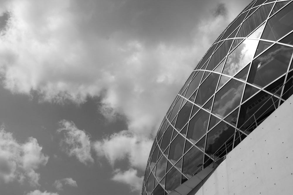 grayscale photo of glass building