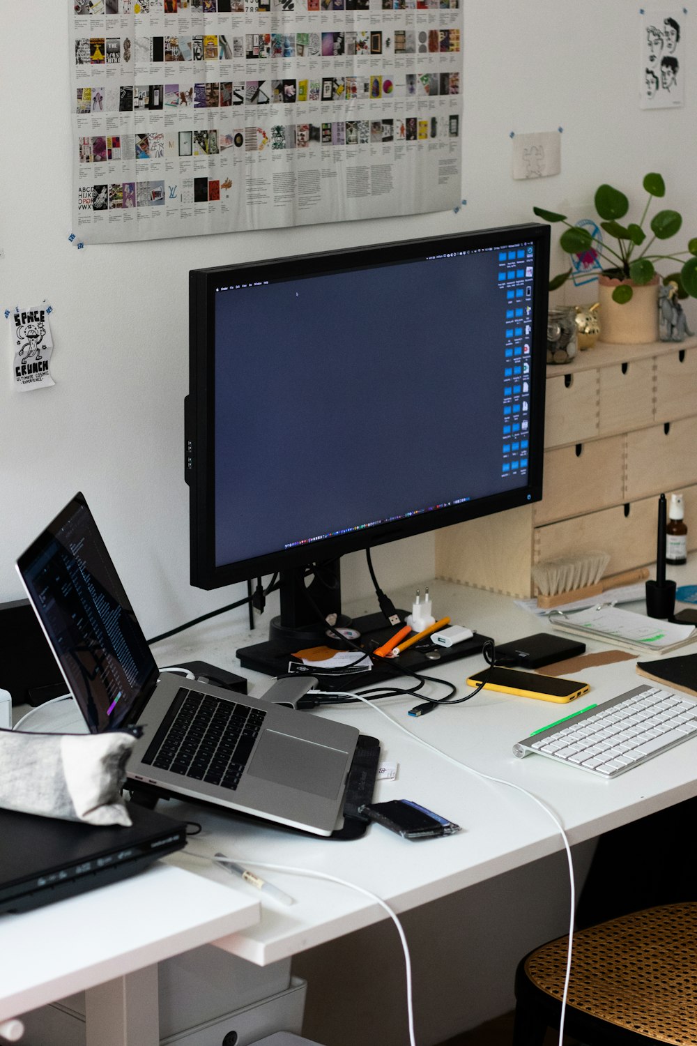 black flat screen computer monitor on white table