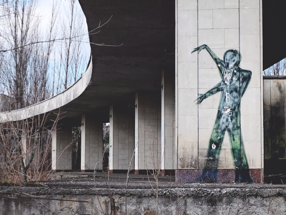 black statue of man in black suit