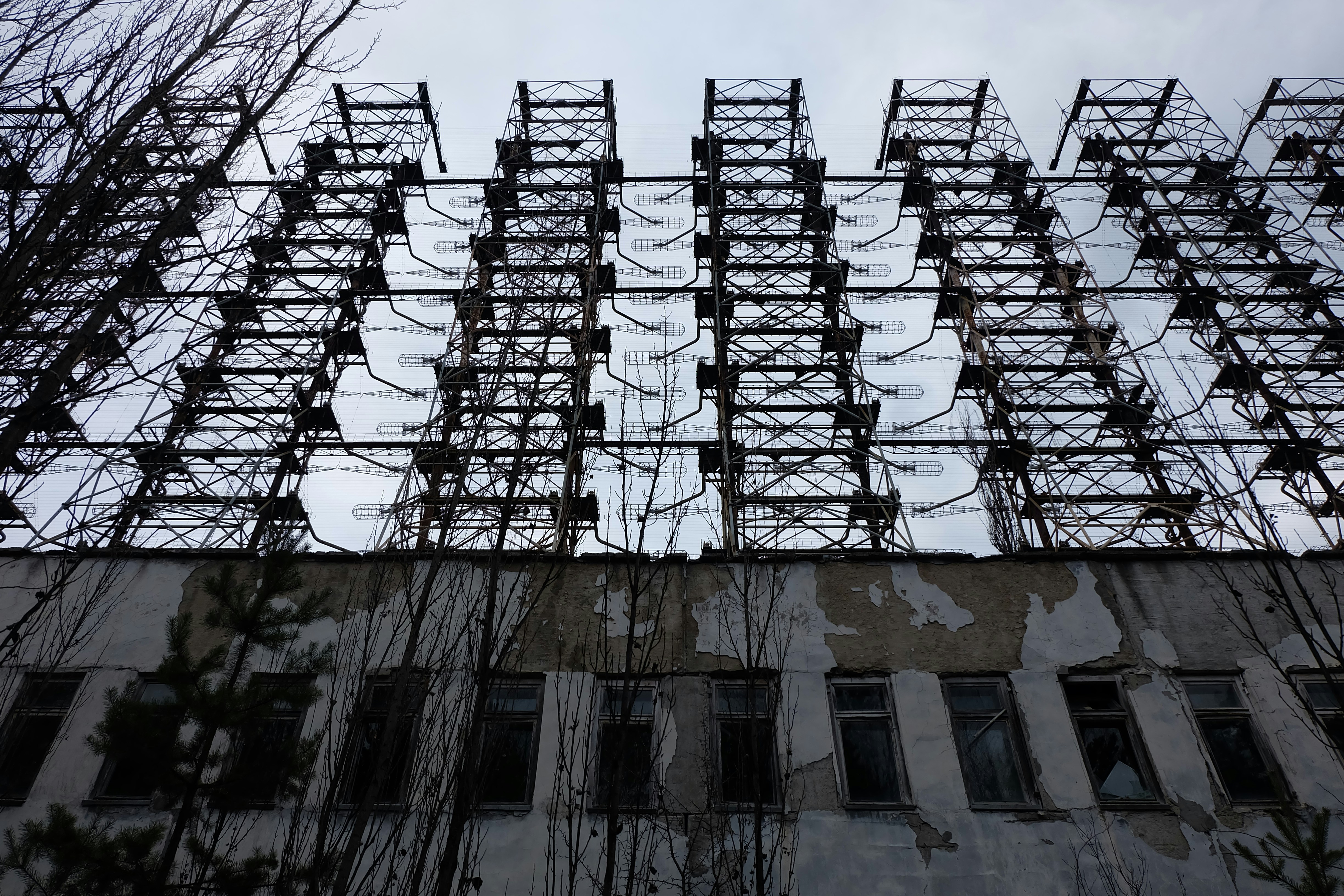 black metal frame on brown concrete building