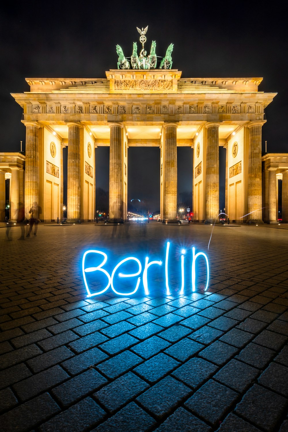 white concrete building with blue light