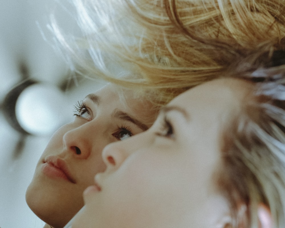 blonde haired girl with white eyes