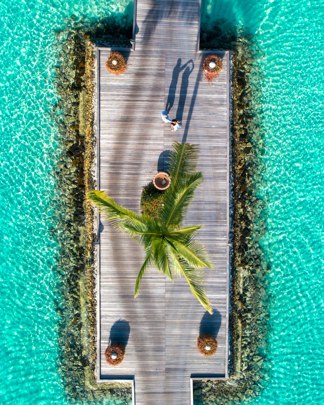 aerial view of 2 people in beach during daytime