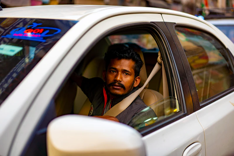 Taxi driver at the wheel