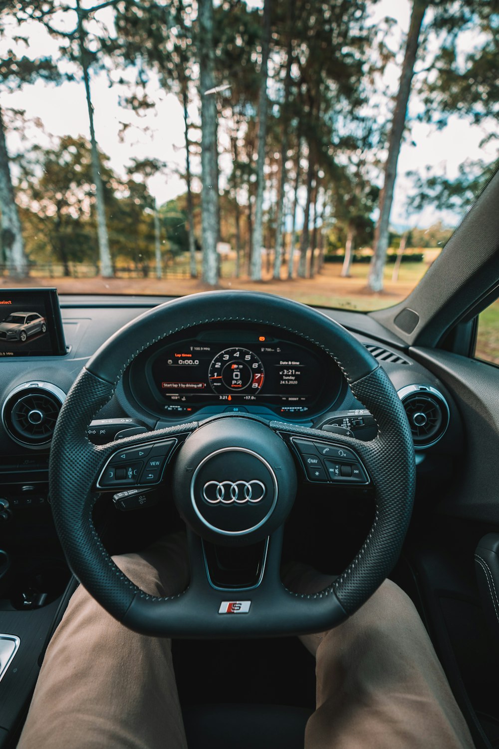 black and silver mercedes benz steering wheel