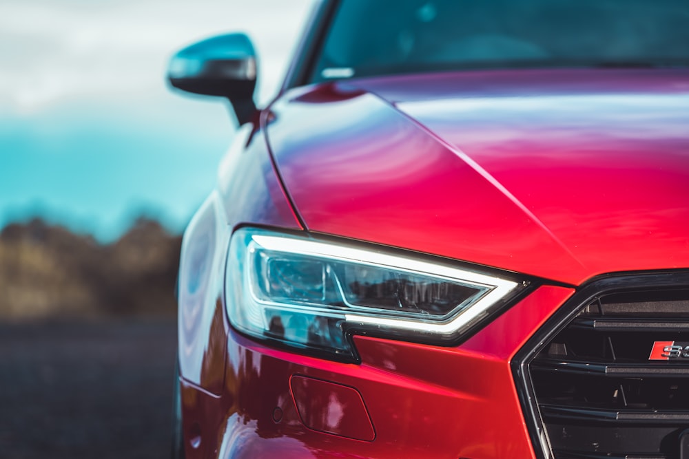 red car with silver car door handle