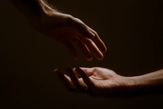 persons hand forming heart