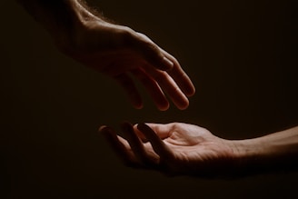 persons hand forming heart