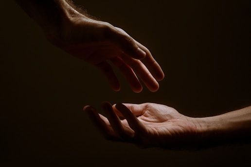 persons hand forming heart