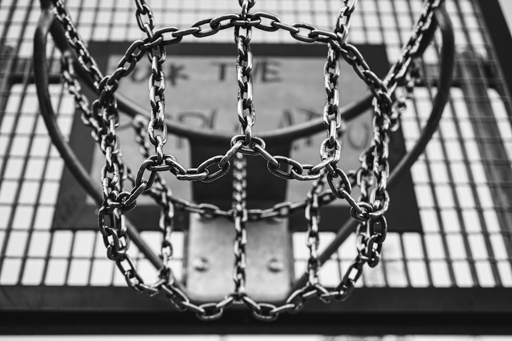 grayscale photo of chain link fence