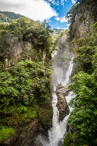 Pailón del Diablo: the 80m Devil's Cauldron framed by jungle