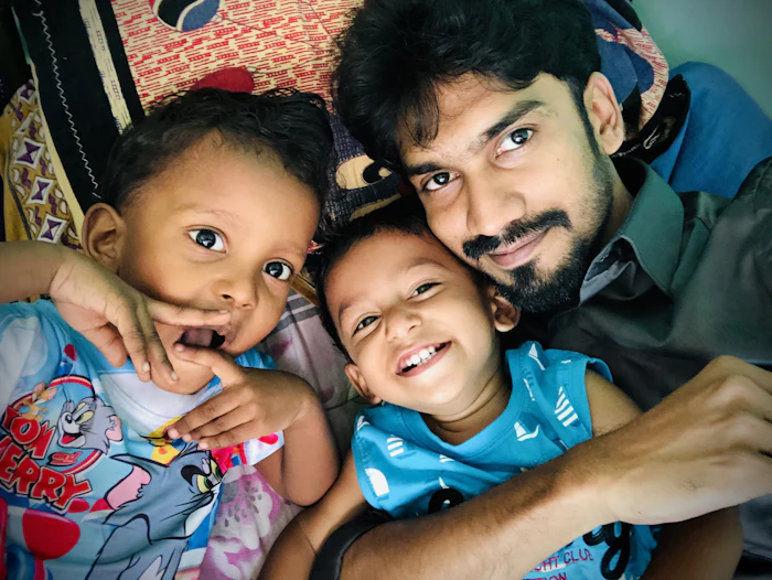 A father with his two children