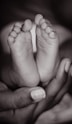 persons feet on black background