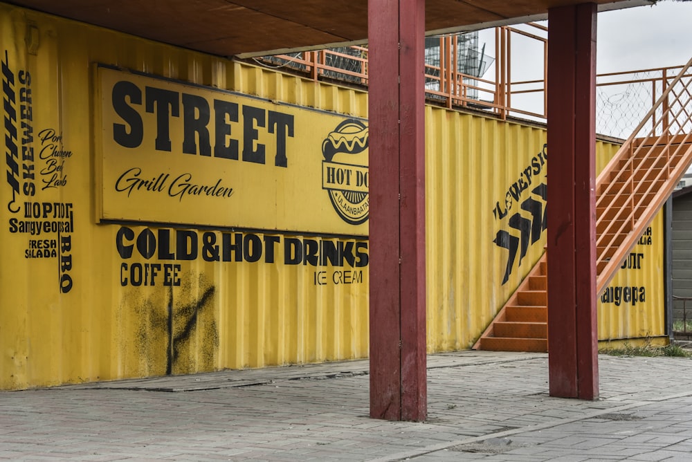 yellow and brown wooden signage