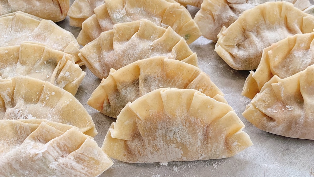 brown dough on white textile