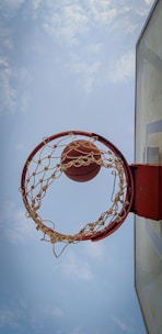 A dynamic short video clip showing basketball shorts spinning on a court.
