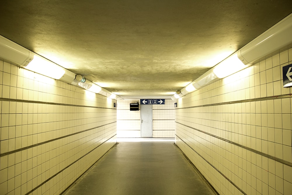 white and black hallway with white ceiling