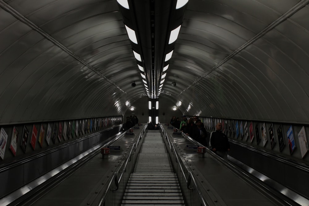 people walking on train station