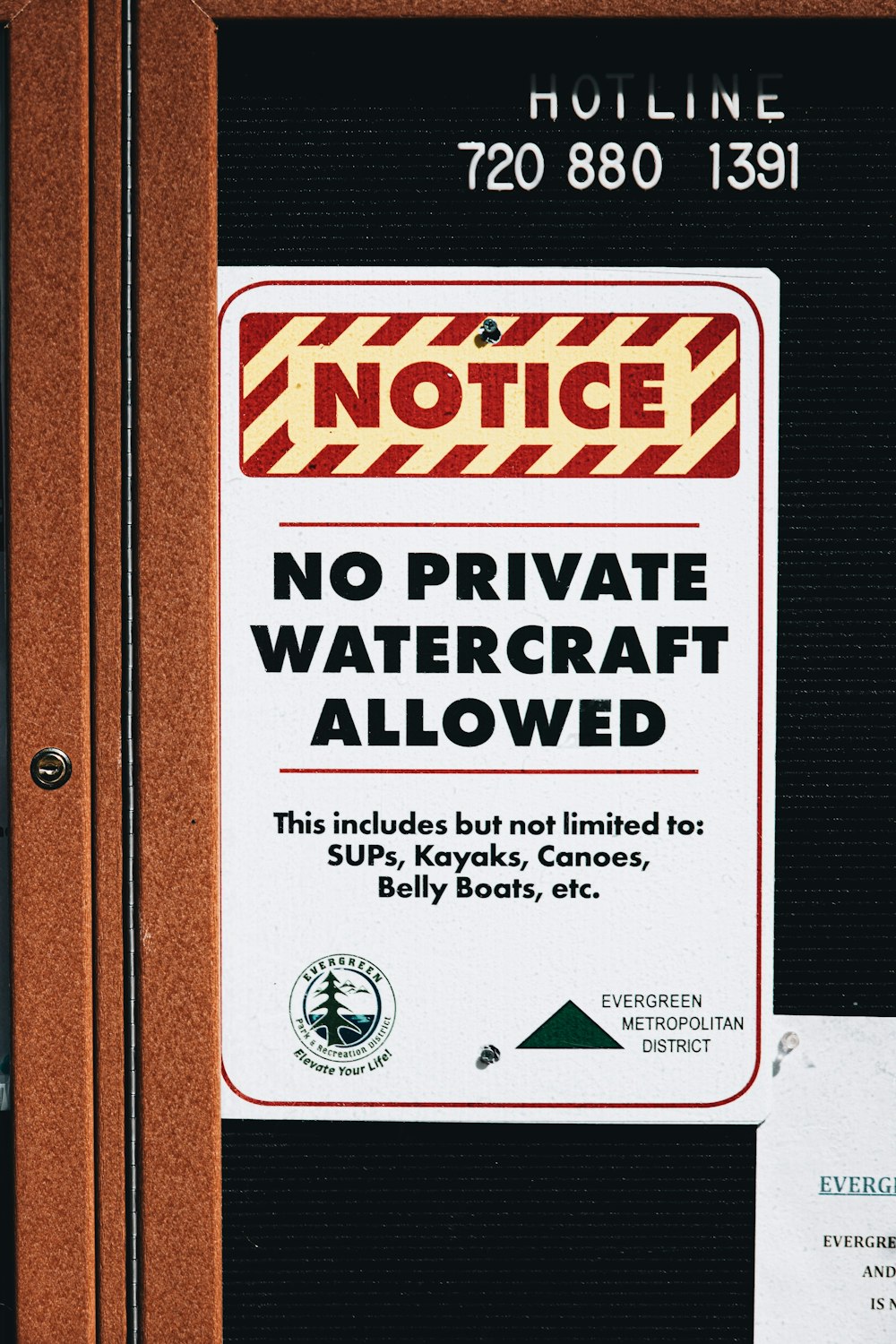 a no private watercraft allowed sign posted on a door