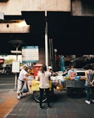 people walking on street during nighttime