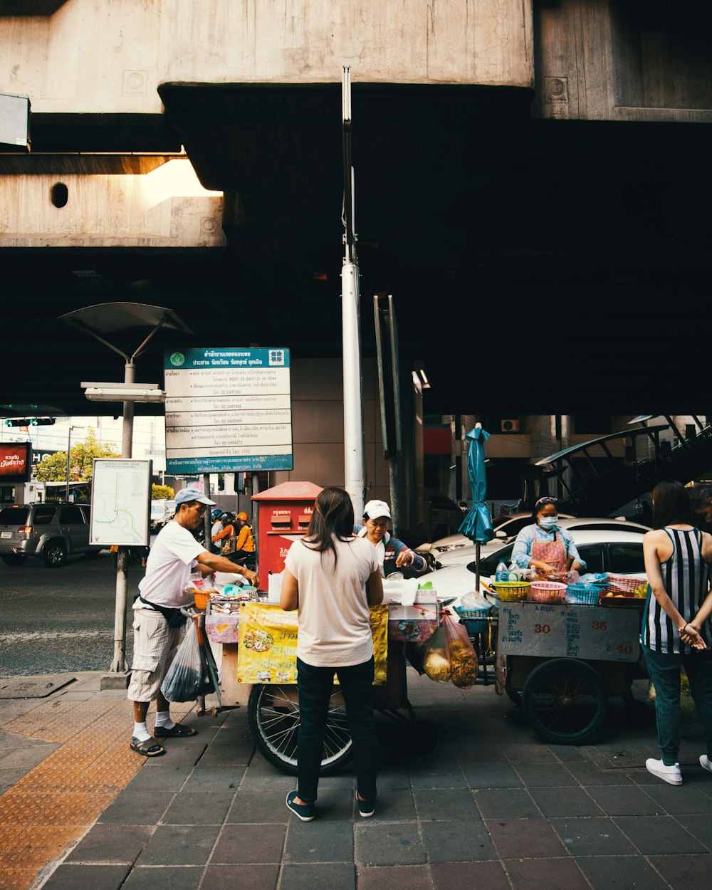 people walking on street during nighttime