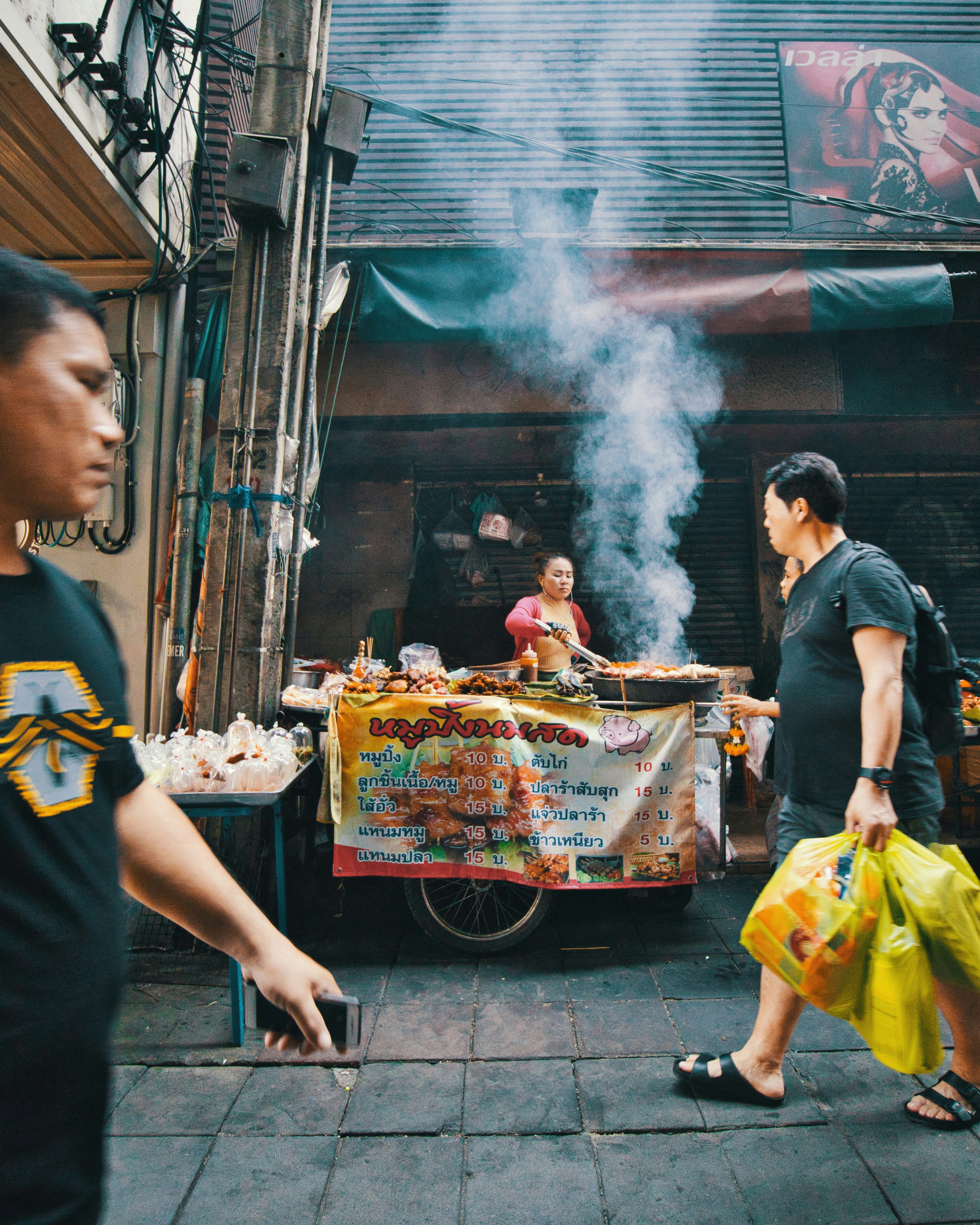man in black crew neck t-shirt holding fire