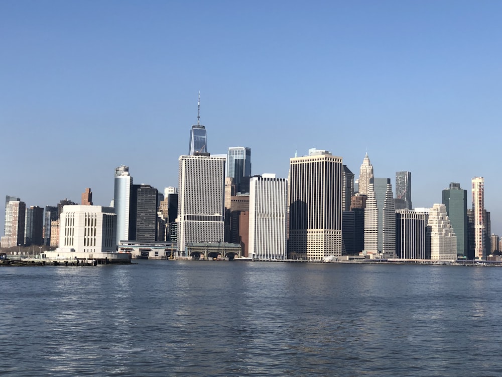 city skyline under blue sky during daytime