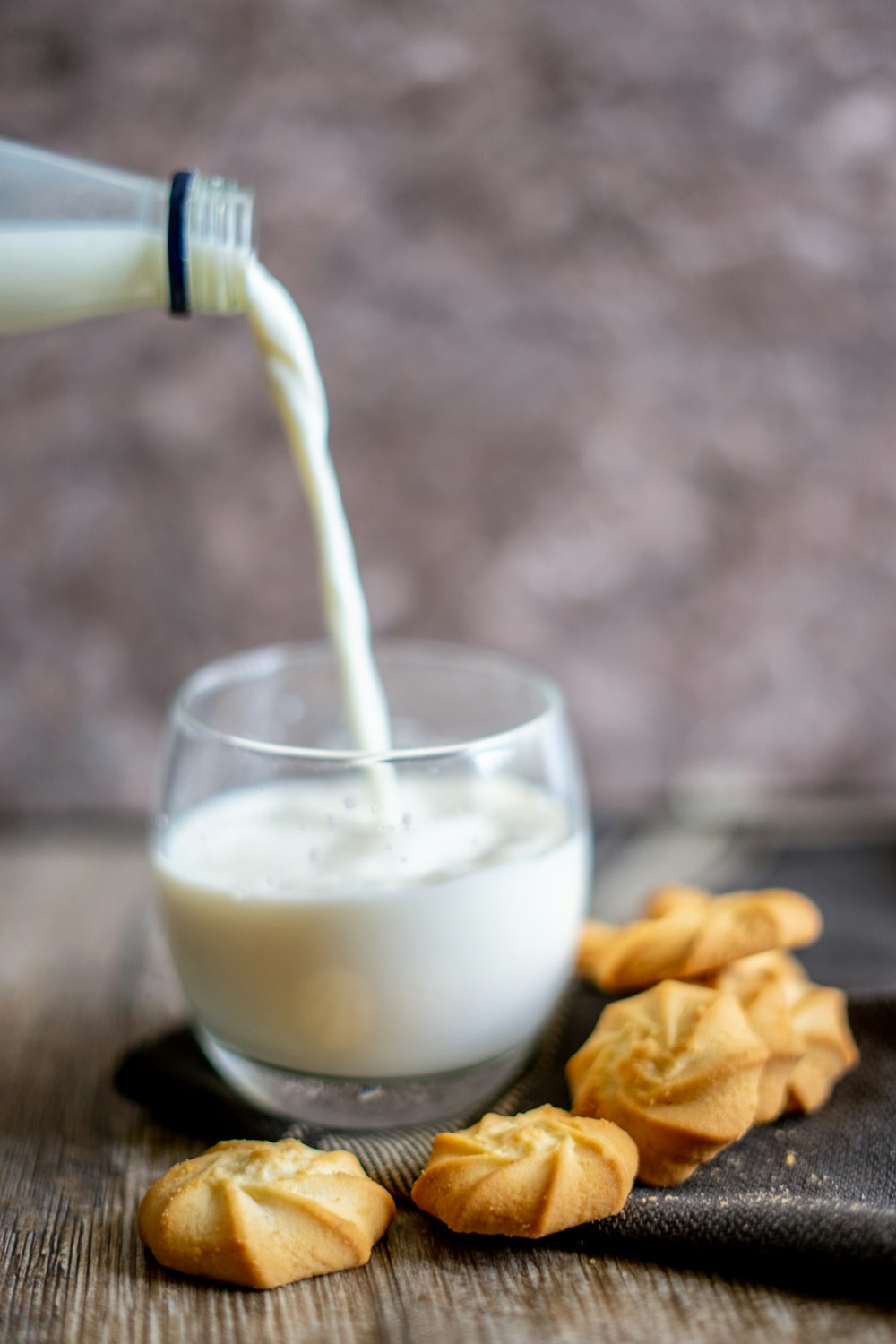 milk in clear drinking glass