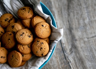 brown cookies in blue ceramic bowl