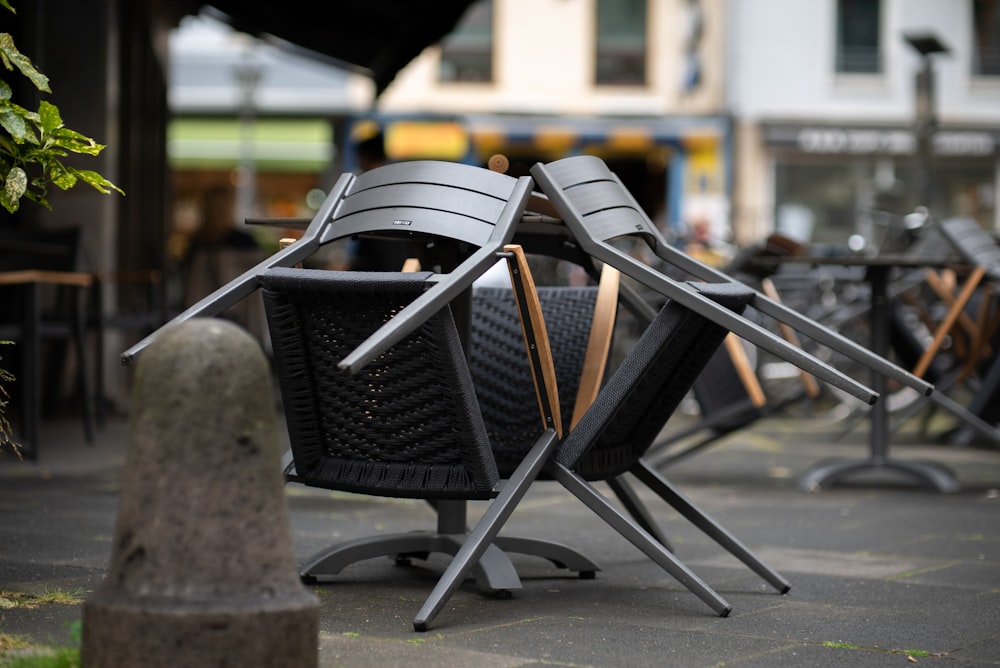 black and brown steel armchairs