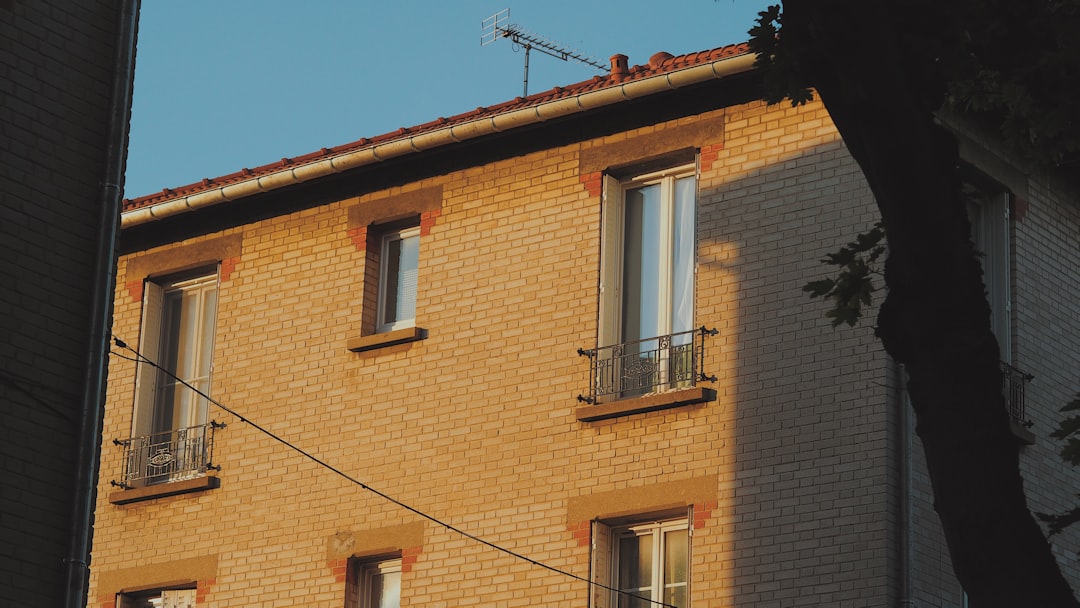 brown concrete building under blue sky during daytime