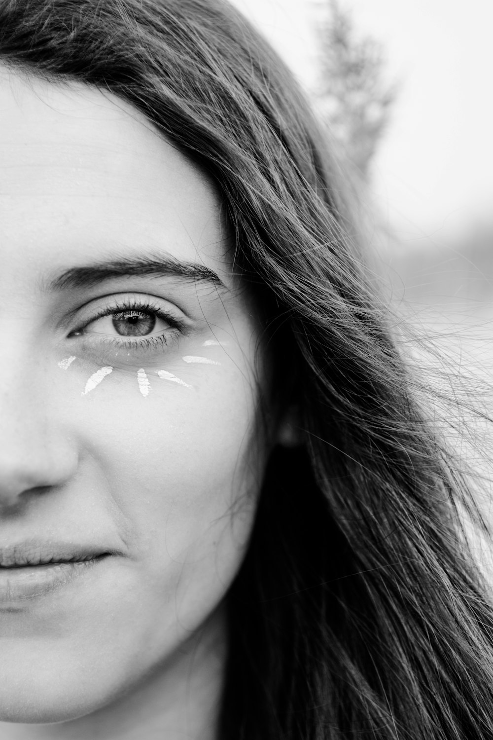 grayscale photo of womans face