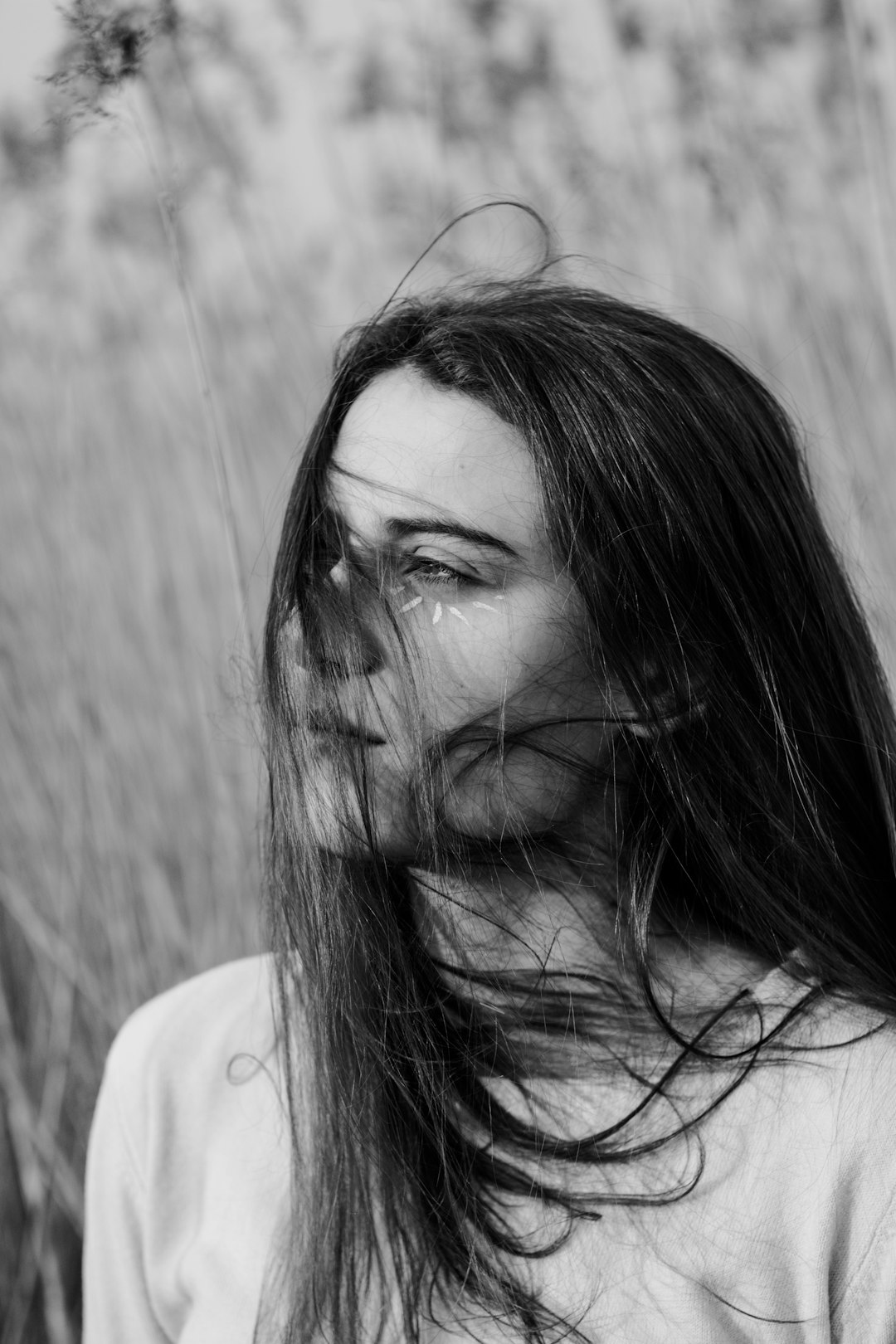 woman in white shirt wearing eyeglasses