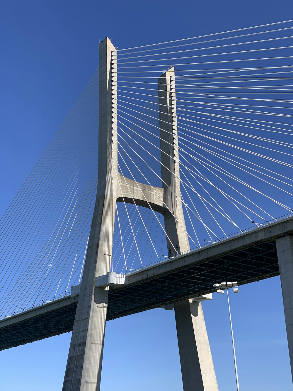 white bridge under blue sky during daytime