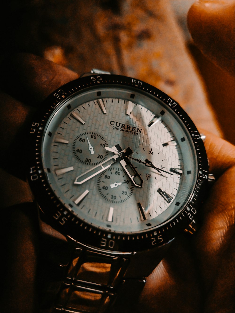 black and silver chronograph watch