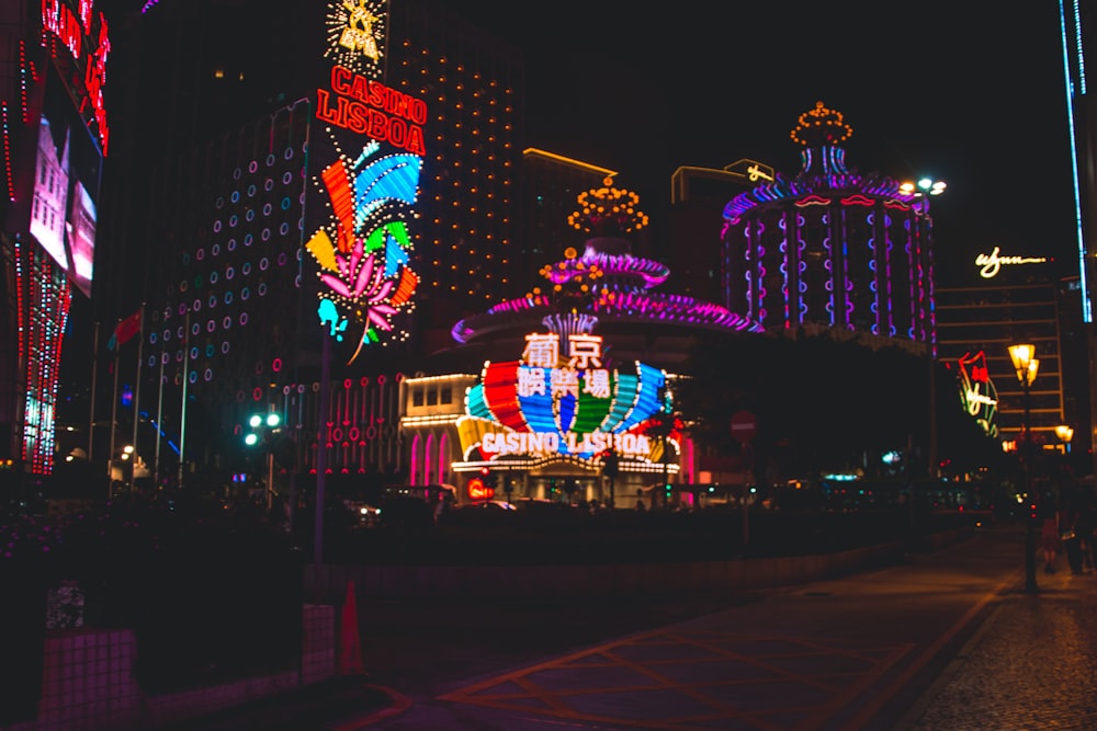 purple and red lighted building during night time